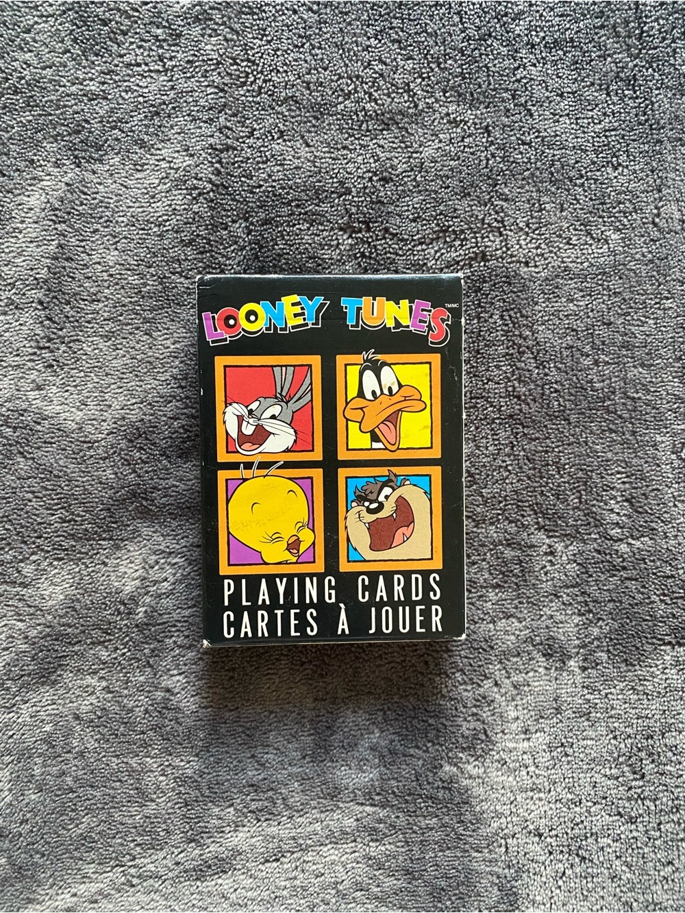 Warner Bros. Looney Tunes Black Playing Card Deck with Multi‑color Logo